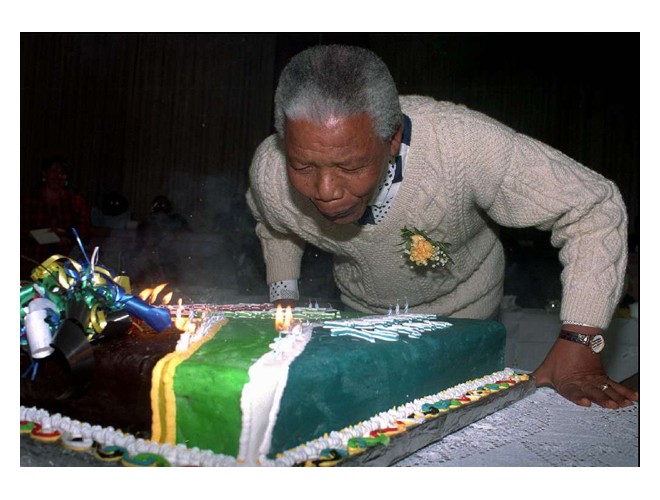 Nalson Mandela blowing Candles