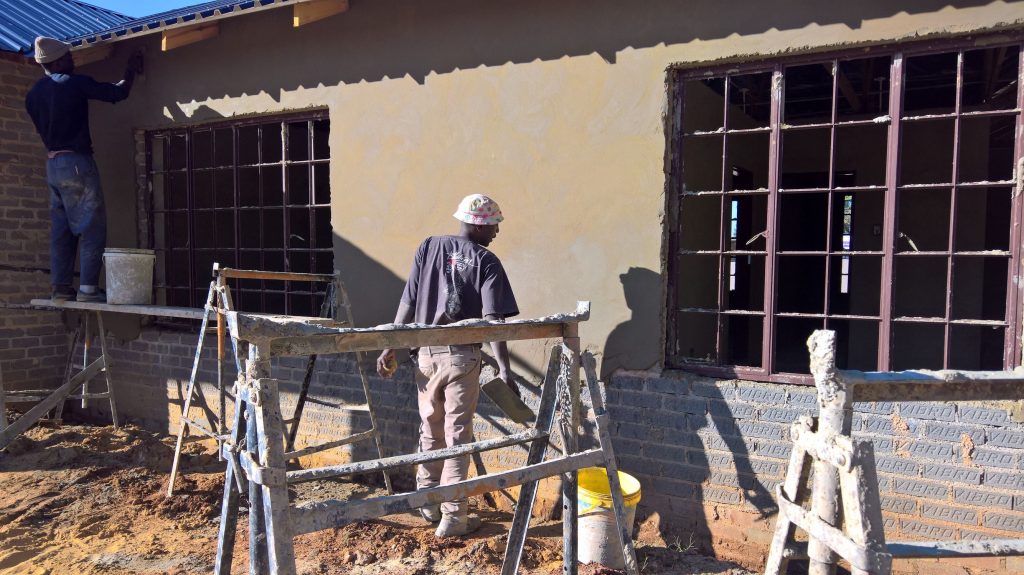 Plastering the outside walls_25